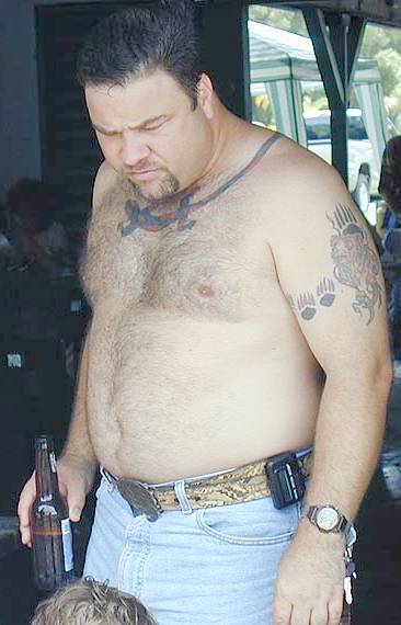 shirtless-bear-with-beer-and-beeper