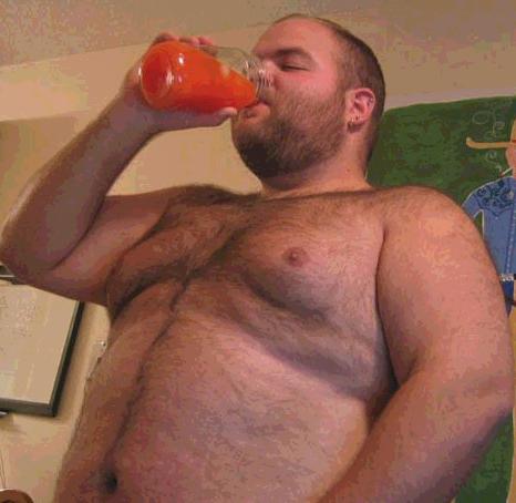 Shirtless bear drinking
